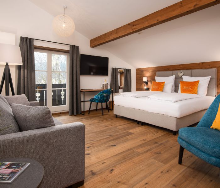 Room at Hotel Terofal in Schliersee with a comfortable box-spring bed