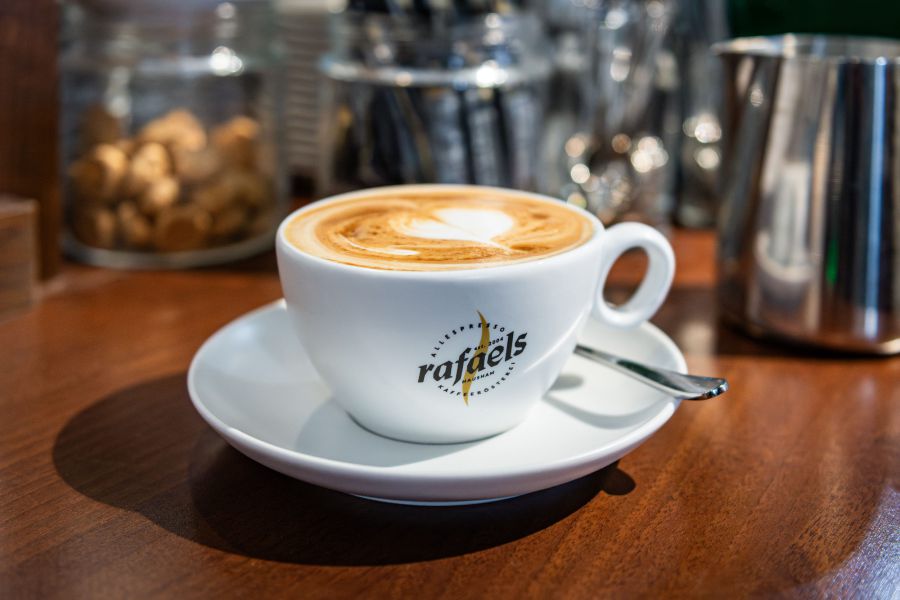 Freshly prepared cappuccino from the portafilter machine at Hotel Terofal in Schliersee