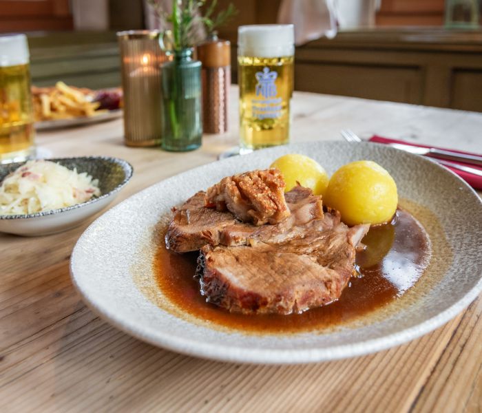 Crispy roast pork with potato dumplings at Xaver in Schliersee