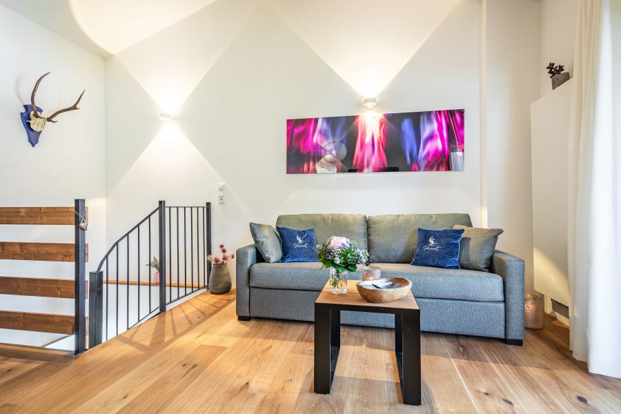 Upper floor with cozy seating area in the “Leni” holiday apartment at Seeheimat in Schliersee